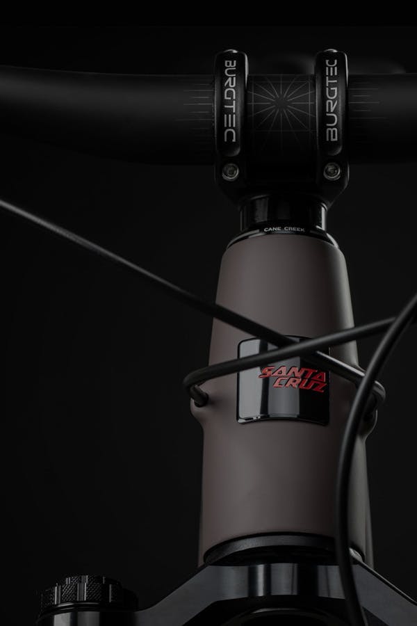 The Tallboy 5 Matte Taube headtube, cables, and fork